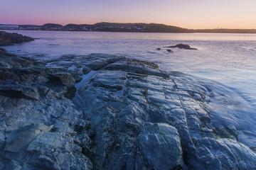 sunrise, coastal rocks at St. Anthony, Newfoundland