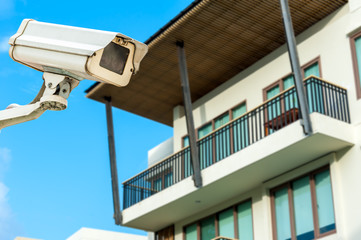 Obraz premium CCTV camera or surveillance operating with corridor apartment in