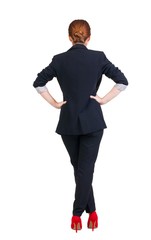 back view of redhead business woman contemplating.