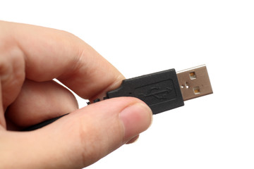 Hand with USB cable