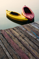 Yellow and Red Kayak on the lake