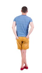 Back view of handsome man in shorts