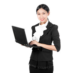 Young business woman holding laptop