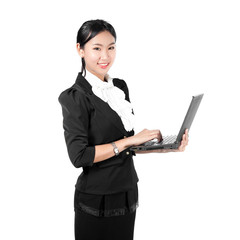 Young business woman holding laptop