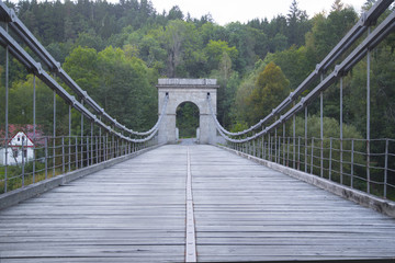 Obraz premium Old chain bridge over the river Luznice in the Czech republic