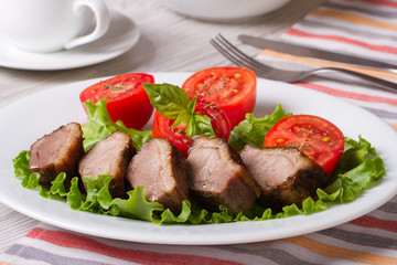 hearty lunch: fried duck meat with vegetables  horizontal