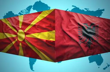 Waving Albanian and Macedonian flags