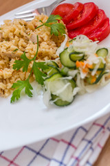 Delicious rice with pork meat and salad