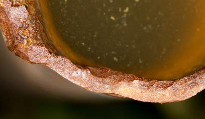 water in a rusty pipe