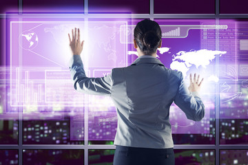 businesswoman working with virtual technologies
