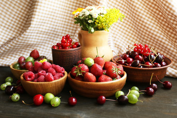 Still life with berries and flowers