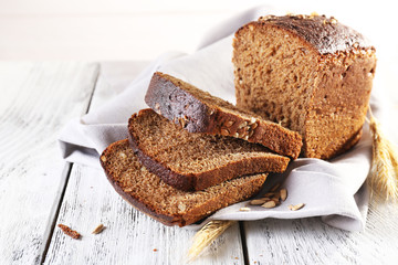 Fresh bread on wooden table, close up