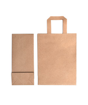 Blank brown paper bags isolated on white background