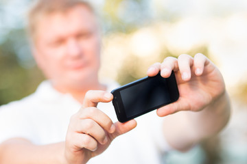 people photographed on a smartphone