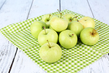 Ripe apples on napkin close-up