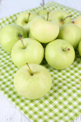 Ripe apples on napkin close-up