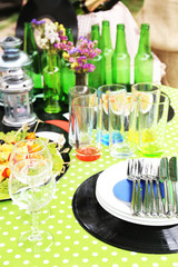 Buffet table with dishware waiting for guests