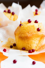 Muffins in paper cupcake holder with lingonberry