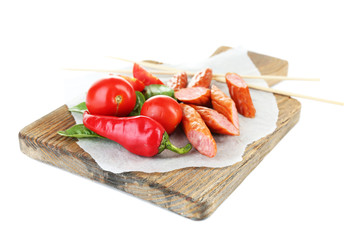 Smoked thin sausages and vegetables