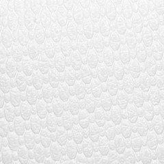 white leather as a background. close-up