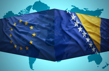 Waving Bosnian and European Union flags