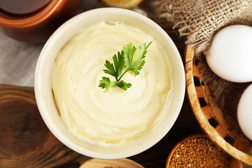 Mayonnaise ingredients on wooden background