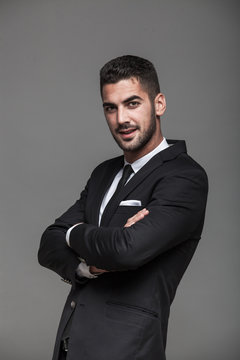 handsome elegant man on grey background
