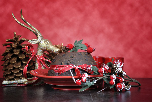 English Style Christmas Plum Pudding Dessert On Red Background.