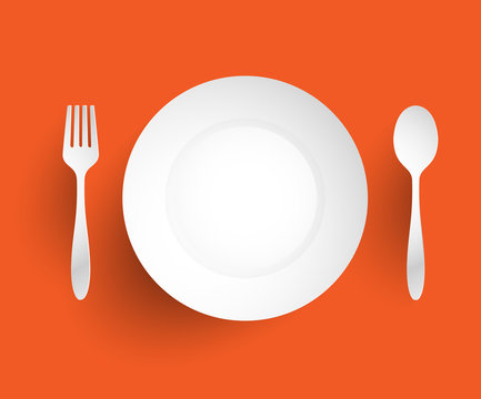 Empty dish, fork and spoon placed alongside. On orange backgroun
