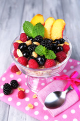 Healthy breakfast - yogurt with  fresh fruit, berries and