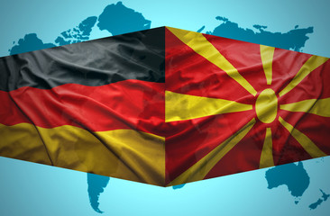 Waving Macedonian and German flags
