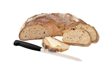 isolated image of bread with grains; bread and butter and a knif