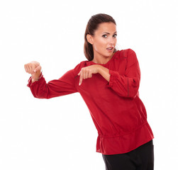 Alone hispanic woman pointing her finger down