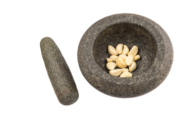 Stone Mortar And Pestle With Garlic
