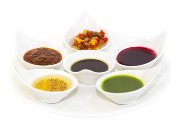 sauces on a white background in the restaurant