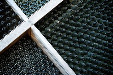 Rows of many empty wine bottles