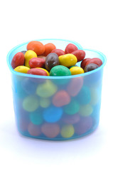 Various Color Of Chocolate Beans In Plastic Container 