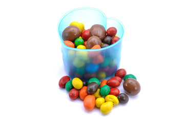 Various Color Of Chocolate Beans In Plastic Container 