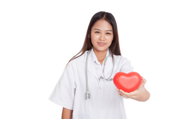 Young Asian female doctor with red heart