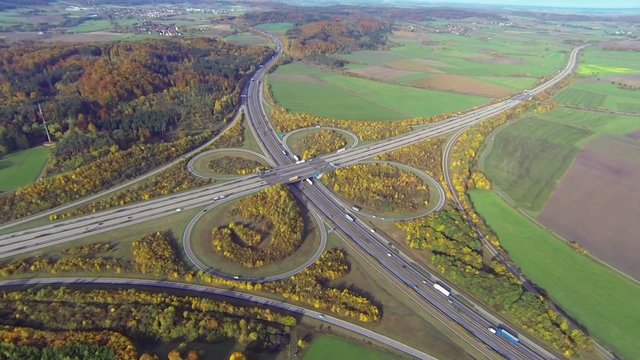aerial view of highway junction in autumn