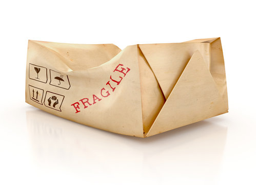Damaged package with a Fragile Handle With Care Sign