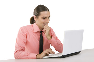 young smiling man with laptop over white background