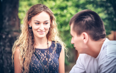 Fototapeta premium unexpected acquaintance of young people on the street