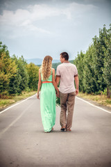 Young couple walking in street