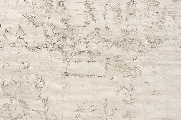 Obraz premium Old stucco wall with cracks and wear