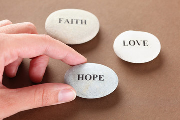 Obraz na płótnie Canvas Hope, Faith and Love stones