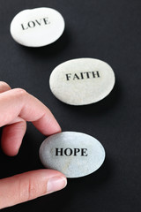 Obraz na płótnie Canvas Hope, Faith and Love stones