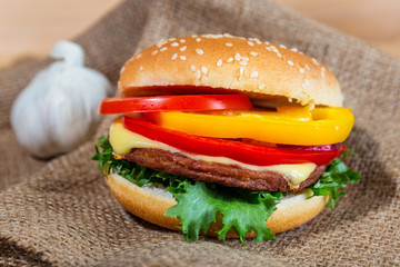 homemade hamburger with fresh vegetables, close up