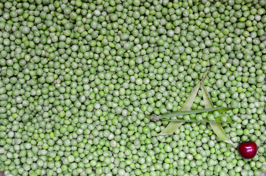 Peas and cherry background
