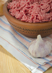 Fresh minced meat in ceramic bowl